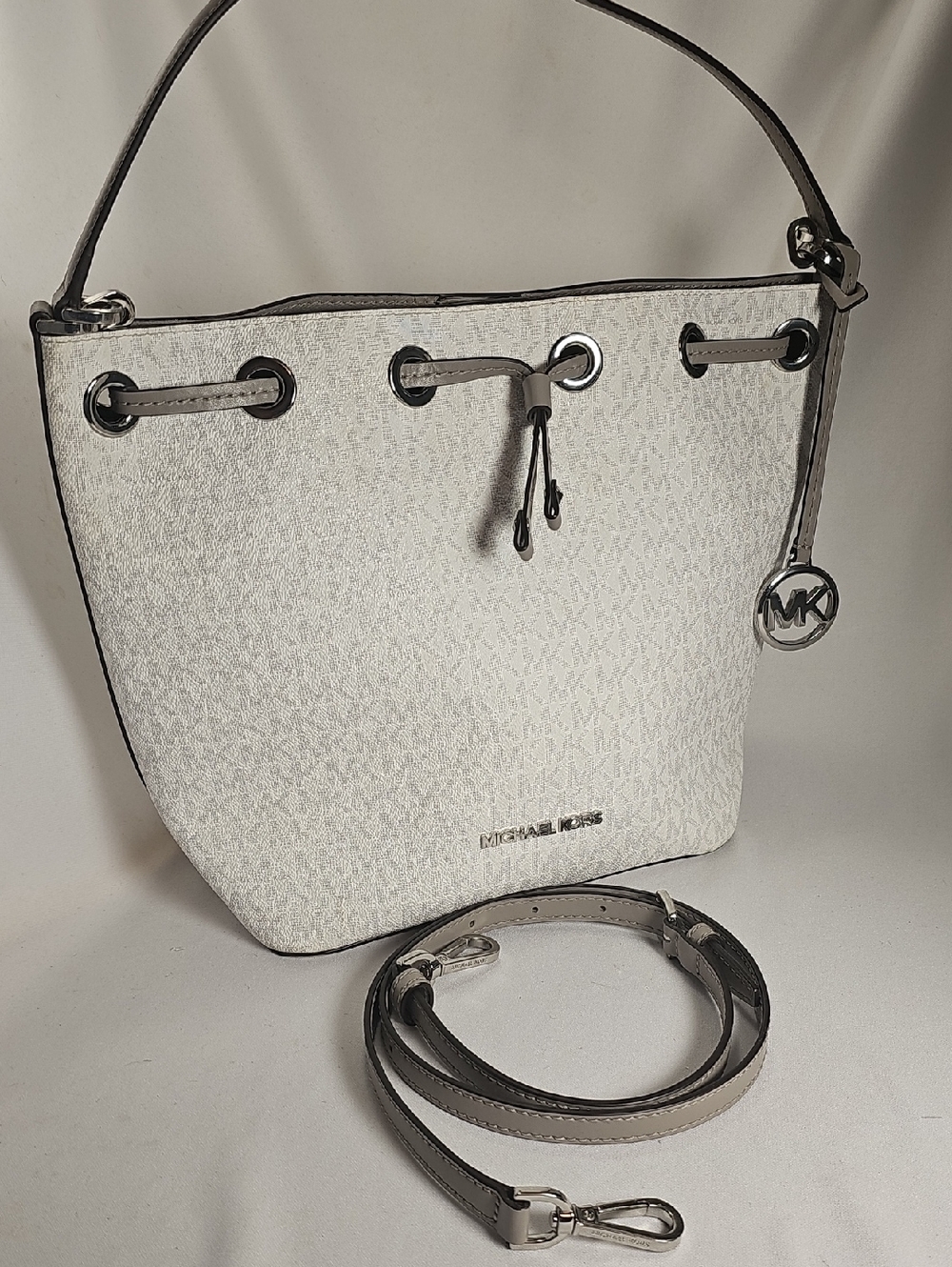 Michael Kors White w/Tan Monogram Drawstring Bucket Bag with Silver Hardware